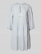 Sukienki - Sukienka tunikowa o kroju ovesized z falbanami model ‘KAYA’ - miniaturka - grafika 1