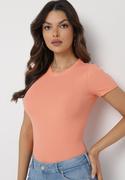 Koszulki i topy damskie - Pomarańczowy Bawełniany T-shirt Elastyczny Lireanne - miniaturka - grafika 1