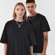 Moda i Uroda OUTLET - Cropp - Czarna koszulka comfort UNISEX - Czarny - miniaturka - grafika 1
