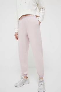Spodnie damskie - New Balance spodnie dresowe bawełniane kolor różowy gładkie - grafika 1