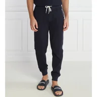 Dresy męskie - Tommy Hilfiger Spodnie dresowe | Regular Fit - miniaturka - grafika 1
