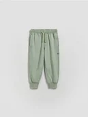 Spodenki dla niemowląt - Reserved - Bawełniane joggery - jasnozielony - miniaturka - grafika 1