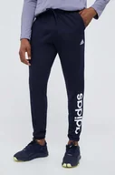 Spodnie męskie - adidas spodnie treningowe Essentials kolor granatowy z nadrukiem - miniaturka - grafika 1