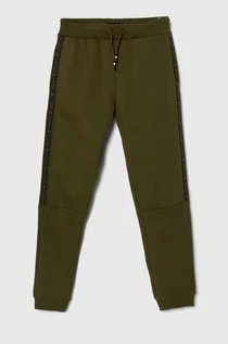 Spodnie i spodenki dla chłopców - Tommy Hilfiger spodnie dresowe dziecięce kolor zielony z aplikacją - grafika 1