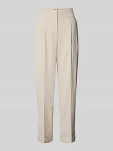 Spodnie materiałowe o kroju tapered fit z zakładkami w pasie - Spodnie damskie - miniaturka - grafika 1