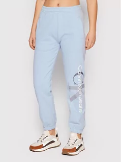 Spodnie sportowe damskie - Calvin Klein Jeans Spodnie dresowe J20J217786 Niebieski Regular Fit - grafika 1
