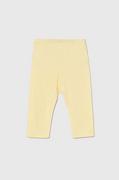 Spodnie i spodenki dla dziewczynek - United Colors of Benetton legginsy dziecięce kolor żółty gładkie - miniaturka - grafika 1