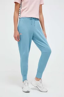 Spodnie damskie - Kappa spodnie dresowe kolor niebieski gładkie - grafika 1