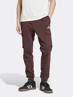 Spodnie sportowe męskie - adidas Spodnie dresowe w kolorze brązowym - miniaturka - grafika 1