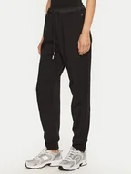 Spodnie sportowe damskie - Champion Spodnie dresowe 117477 Czarny Slim Fit - miniaturka - grafika 1