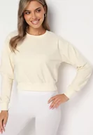 Bluzy damskie - Jasnobeżowa Bluza z Dodatkiem Bawełny Wykończona Ściągaczami Evilaya - miniaturka - grafika 1