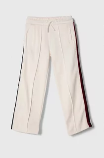 Spodnie i spodenki dla dziewczynek - Tommy Hilfiger spodnie dresowe dziecięce kolor biały wzorzyste - grafika 1
