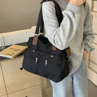 Torebki damskie - TEMU 1 szt. Damska Torba Tote o Dużej Pojemności z Wieloma Kieszeniami, Regulowanym Paskiem na Ramię, Wytrzymała Czarna Torba z Nylonu dla Studentów, - miniaturka - grafika 1