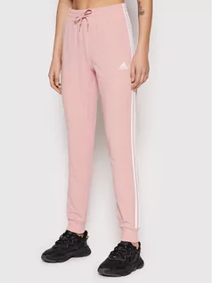 Spodnie sportowe damskie - Adidas Spodnie dresowe Essentials HD427 Różowy Slim Fit - grafika 1