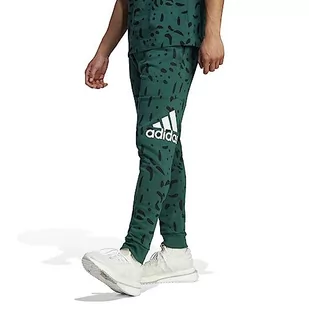 adidas Męskie spodnie Essentials ze zwężanym mankietem z logo na całej długości (1/1), Zielony (Collegiate Green), XL - Spodenki męskie - miniaturka - grafika 1