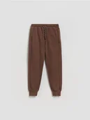 Spodnie i spodenki dla chłopców - Reserved - Bawełniane joggery - ciemnobrązowy - miniaturka - grafika 1