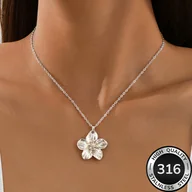 Naszyjniki - TEMU Wysokiej jakości złoty naszyjnik 'S z nierdzewnej stali 316 z motywem kwiatowym dla kobiet. Jest odporny na blaknięcie, wygodny, wszechstronny i - miniaturka - grafika 1