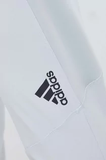 Spodnie męskie - adidas Performance spodnie treningowe Designed for Training kolor szary gładkie - grafika 1
