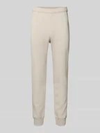 Spodnie sportowe męskie - Spodnie dresowe z elastycznym pasem i wyhaftowanym logo - miniaturka - grafika 1