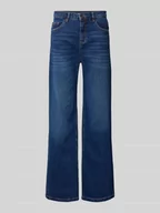 Spodnie damskie - Jeansy o kroju relaxed fit ze szwami w kontrastowym kolorze - miniaturka - grafika 1