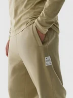 Spodnie sportowe męskie - Męskie spodnie dresowe 4F 4FWAW24TTROM0824 - zielone - miniaturka - grafika 1