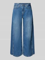 Spodnie damskie - Jeansy o kroju baggy fit z 5 kieszeniami - miniaturka - grafika 1