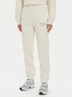 Spodnie sportowe damskie - New Balance Spodnie dresowe WP43500 Beżowy Relaxed Fit - miniaturka - grafika 1