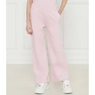 Spodnie sportowe damskie - Guess Spodnie dresowe flare fit - miniaturka - grafika 1