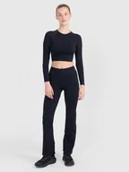 Spodnie sportowe damskie - 4F Spodnie treningowe bezszwowe z rozszerzanymi nogawkami damskie - czarne M/L - miniaturka - grafika 1