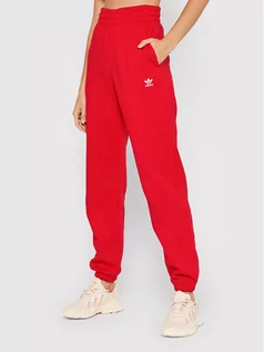 Spodnie sportowe damskie - Adidas Spodnie dresowe adicolor Essentials Fleece HF7513 Czerwony Regular Fit - grafika 1