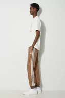 Spodnie męskie - adidas Originals spodnie dresowe kolor brązowy wzorzyste - miniaturka - grafika 1