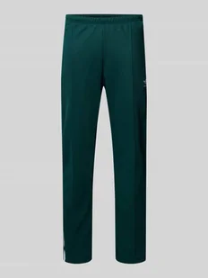 Spodnie dresowe z elastycznym ściągaczem - Spodnie sportowe męskie - miniaturka - grafika 1
