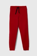 Spodnie i spodenki dla dziewczynek - United Colors of Benetton spodnie dresowe bawełniane dziecięce kolor czerwony z nadrukiem - miniaturka - grafika 1