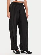 Spodnie sportowe damskie - Puma Spodnie dresowe PUMA X ROSÉ T7 633796 01 Czarny Relaxed Fit - miniaturka - grafika 1