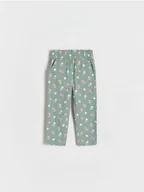 Spodnie i spodenki dla dziewczynek - Reserved - Wzorzyste spodnie - ciemnozielony - miniaturka - grafika 1