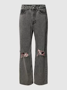 Spodnie damskie - Jeansy o rozkloszowanym kroju z efektem znoszenia - grafika 1