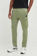 Spodnie męskie - adidas spodnie dresowe City Escape kolor zielony z aplikacją IV7419 - miniaturka - grafika 1