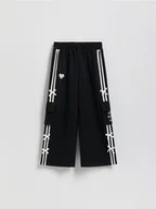 Spodnie i spodenki dla dziewczynek - Reserved - Spodnie dresowe z kokardkami - czarny - miniaturka - grafika 1