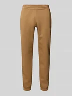 Spodnie sportowe męskie - Spodnie dresowe z elastycznym ściągaczem - miniaturka - grafika 1