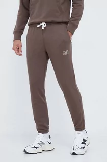 Spodnie męskie - New Balance spodnie dresowe kolor brązowy gładkie - grafika 1