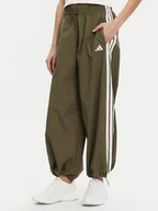 Spodnie sportowe damskie - adidas Spodnie dresowe Essentials 3-Stripes JE1308 Zielony Loose Fit - miniaturka - grafika 1