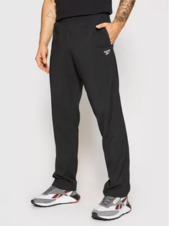 Spodnie męskie - Reebok Spodnie dresowe Training Essentials Woven FP9170 Czarny Regular Fit - grafika 1