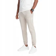 Dresy męskie - Męskie spodnie dresowe z dzianiny jasnobeżowe V1 OM-PASK-0211 XXL - miniaturka - grafika 1