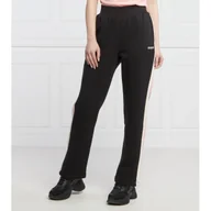 Dresy damskie - GUESS ACTIVE Spodnie dresowe BRANDIE | Relaxed fit - miniaturka - grafika 1