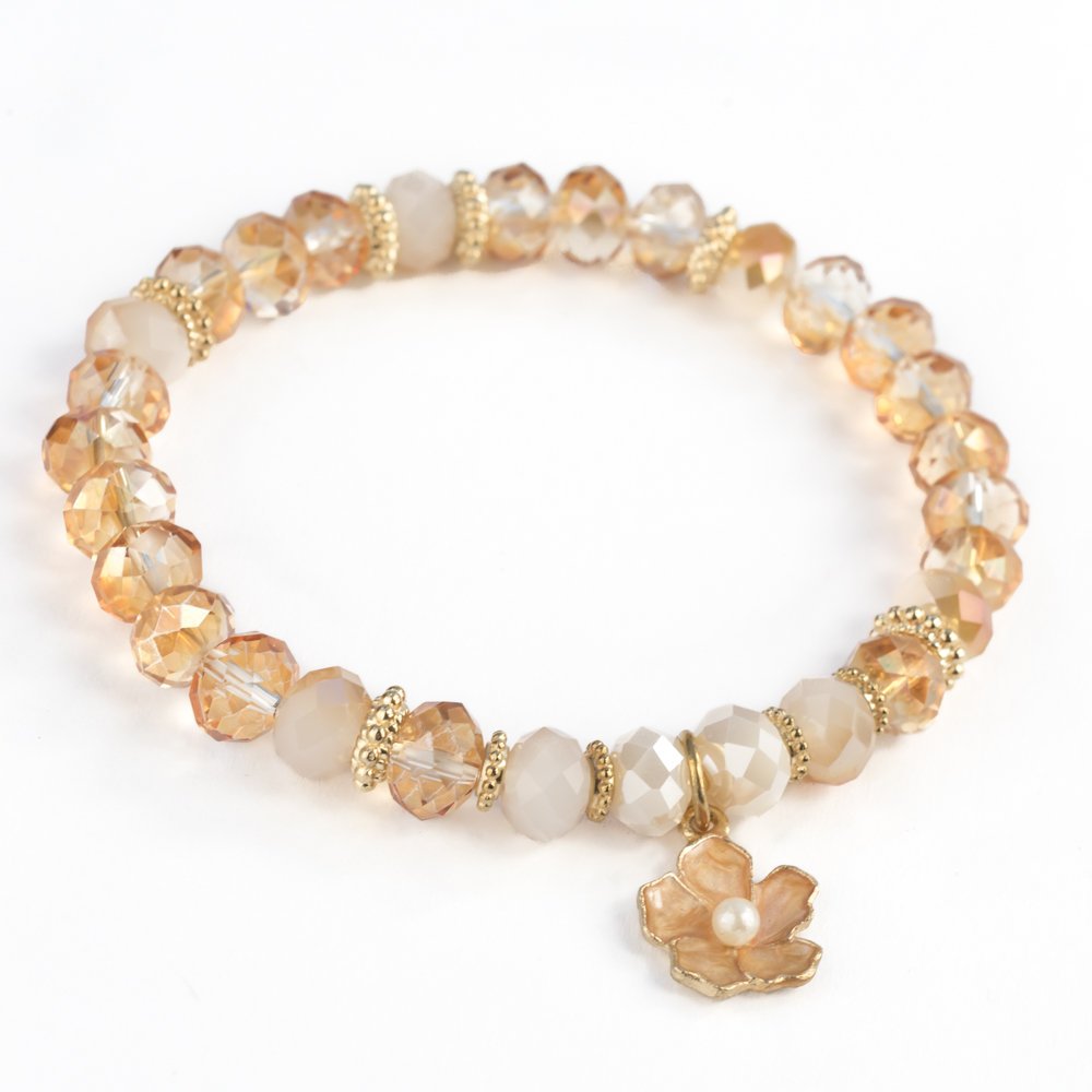 Bransoletka elastyczna szampańskie kryształki, kwiat emalia / JG. Projekt