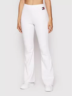 Spodnie sportowe damskie - Tommy Jeans Spodnie dresowe Badge Flare DW0DW12642 Biały Slim Fit - grafika 1