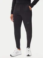 Spodnie sportowe męskie - adidas Spodnie dresowe Designed for Training Hybrid IY1123 Czarny Slim Fit - miniaturka - grafika 1