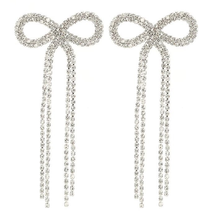 Srebrne kolczyki kokardki eleganckie błyszczące wieczorowe długie nitki