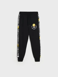 Sinsay - Spodnie Smiley World - czarny - Spodnie i spodenki dla chłopców - miniaturka - grafika 1