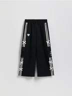 Spodnie i spodenki dla dziewczynek - Reserved - Spodnie dresowe z kokardkami - czarny - miniaturka - grafika 1